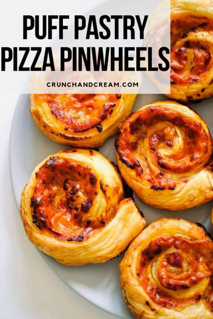 These pizza pinwheels are super quick and easy thanks to store-bought puff pastry. You can add all the toppings you like way beyond the basic sauce and cheese. Plus, they're re heatable and even delicious cold! #puffpastrypizzarolls #puffpastrypizzavegetarian #puffpastrypizzascrolls #puffpastrypizzapinwheels