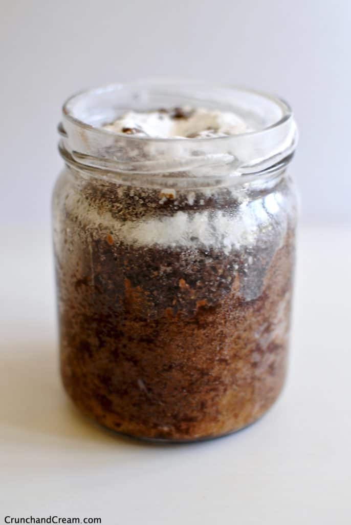 A gooey, chocolatey and fudgy brownie for one baked in a mason jar for the ultimate cute presentation. It's a perfectly sized portion to serve 1 as an indulgent snack or dessert.
