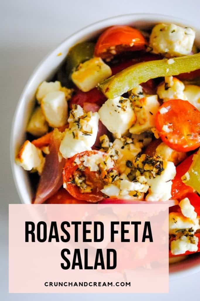 A roasted feta salad with herbs, chilli flakes and olive oil coating strips of bell peppers and cherry tomatoes. It's a delicious light and healthy vegetarian lunch or side dish - or a great starter for a bbq or other summer gathering! #warmsaladrecipelunches #warmsaladrecipe #quickeasysaladrecipe #easysaladrecipelunches