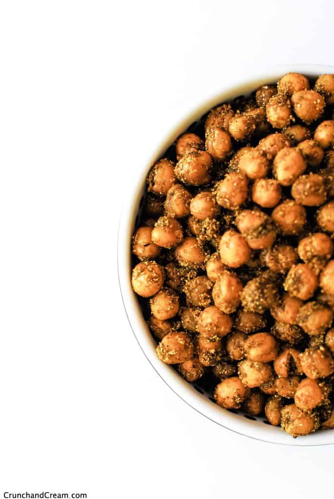 overhead of a bowl full of Indian spice-coated chickpeas
