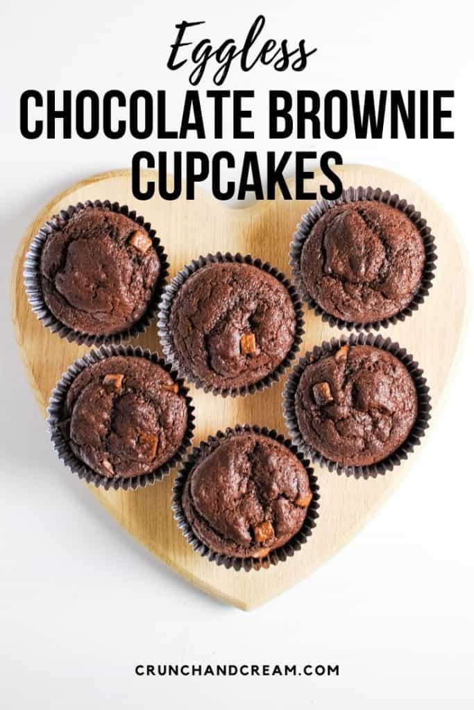 These simple eggless chocolate brownie cupcakes are moist and gooey thanks to plain yogurt and plenty of chocolate chips! #chocolatebrowniecupcakes #egglesscupcakes #chocolatecupcakes #yogurtcupcakes
